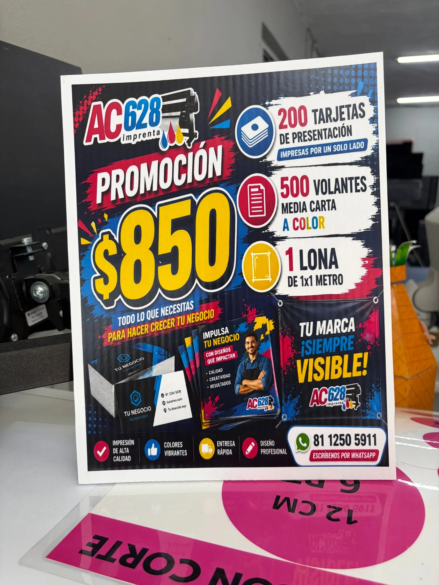 Promoción de AC628 con tarjetas, volantes y lona
